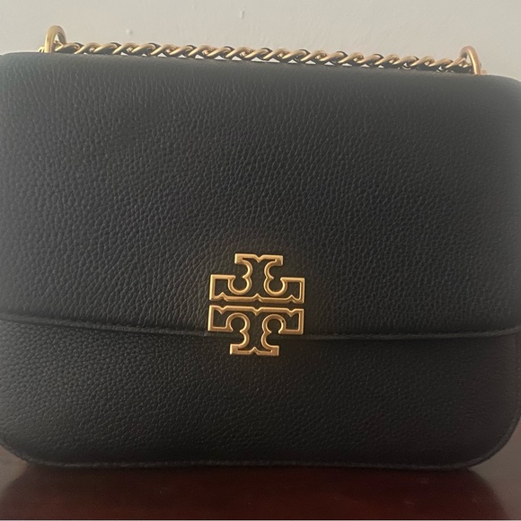 Tory Burch Handbags - Tory Burch Black and Gold Crossbody Bag with Chain Strap. NWOT!!